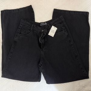 calca jeans ozzo wide leg preta 42 140553648?action_source=72470&ref=home_home&rsp=1&rspix=1