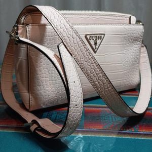 bolsa transversal guess cor peonia cg729114 125444996?action_source=77090&ref=home_home&rsp=1&rspix=1