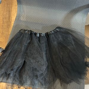 saia tutu preta brilhante 134149412?action_source=67456&ref=home_home&rsp=1&rspix=1
