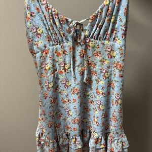 vestido feminino azul floral babado 147295072?action_source=74549&ref=home_home&rsp=1&rspix=1