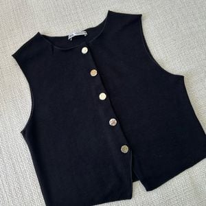 colete tricot zara preto p 150192592?action_source=72470&ref=home_home&rsp=1&rspix=1