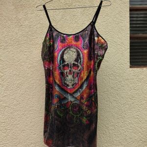 vestido ed hardy lantejoulas caveira m 143604664?action_source=72701&ref=home_home&rsp=1&rspix=1