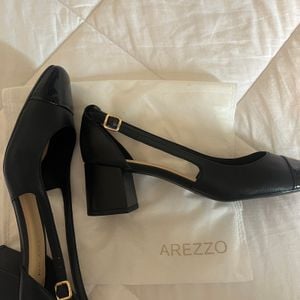 sapato arezzo salto medio bloco preto 36 143956150?action_source=72470&ref=home_home&rsp=1&rspix=1