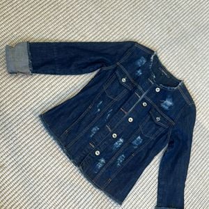 jaqueta jeans shoulder destroyed sem gola tam p 134134474?action_source=71480&ref=home_home&rsp=1&rspix=1