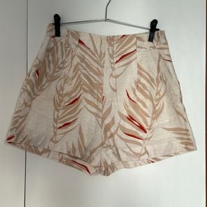 short cintura alta bege clarinho com estampa verao 135139246?action_source=68477&ref=home_home&rsp=1&rspix=1
