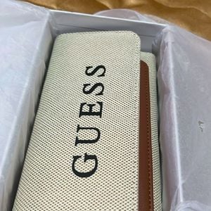 bolsa com carteira original da guess 137508917?action_source=70655&ref=home_home&rsp=1&rspix=1