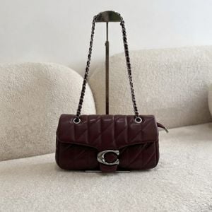 bolsa coach acolchoada vinho 146903320?action_source=72470&ref=home_home&rsp=1&rspix=1
