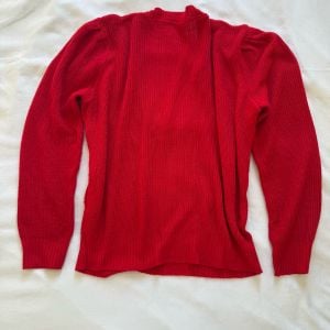 blusa de trico vermelha decote v m 142071908?action_source=31319&ref=home_home&rsp=1&rspix=1