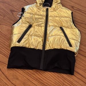 colete puffer metalizado dourado animale 142839931?action_source=74450&ref=home_home&rsp=1&rspix=1
