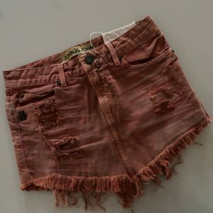 saia jeans john john destroyed vermelho magenta 136390768?action_source=69401&ref=home_home&rsp=1&rspix=1