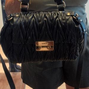 bolsa snimale couro preta 149790507?action_source=64648&ref=home_home&rsp=1&rspix=1