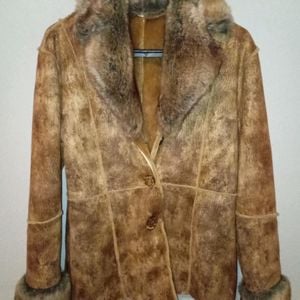 casaco feminino marrom com pelos g 147077962?action_source=75473&ref=home_home&rsp=1&rspix=1