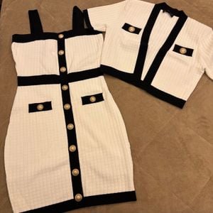 conjunto vestido e casaqueto branco e preto m 146967960?action_source=74549&ref=home_home&rsp=1&rspix=1