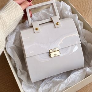 bolsa melissa pupila branca 151968850?action_source=76405&ref=home_home&rsp=1&rspix=1