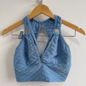 top soutien esportivo azul claro m 145993981?action_source=75018&ref=home_home&rsp=1&rspix=1
