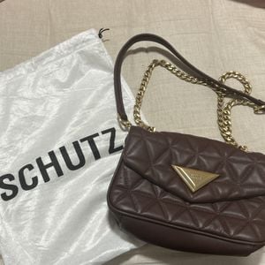 bolsa schutz matelasse marrom 147441261?action_source=72470&ref=home_home&rsp=1&rspix=1