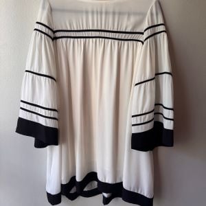 vestido branco loja tres com forro tam g 124787487?action_source=66827&ref=home_home&rsp=1&rspix=1