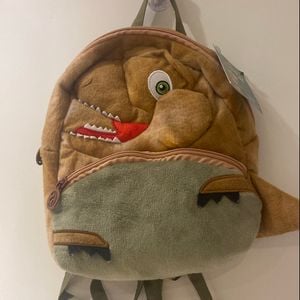 mochilinha dinossauro cacau show 126138316?action_source=66794&ref=home_home&rsp=1&rspix=1