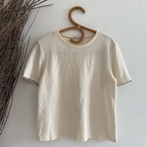 blusa zara manga curta off white 149626418?action_source=75772&ref=home_home&rsp=1&rspix=1