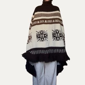 poncho de trico com gola alta 139119121?action_source=76035&ref=home_home&rsp=1&rspix=1
