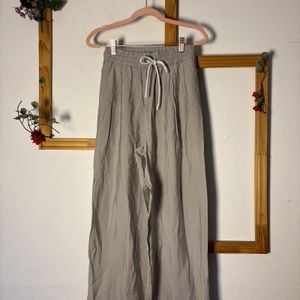 calca zara cinza com cordao 141835249?action_source=71711&ref=home_home&rsp=1&rspix=1