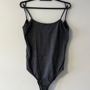 body da zara 125522758?action_source=60227&ref=home_home&rsp=1&rspix=1