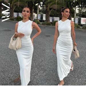 vestido branco midi drapeado zara 129929131?action_source=66827&ref=home_home&rsp=1&rspix=1