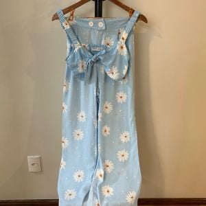 conjunto top e calca margaridas bershka 139152180?action_source=69599&ref=home_home&rsp=1&rspix=1