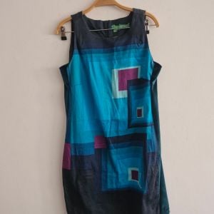vestido desigual estampado geometrico 150250031?action_source=74549&ref=home_home&rsp=1&rspix=1