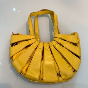 bolsa de mao 148526872?action_source=72767&ref=home_home&rsp=1&rspix=1
