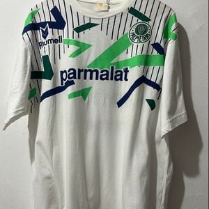 camisa de futebol palmeiras parmalat rhumell 132692429?action_source=66496&ref=home_home&rsp=1&rspix=1