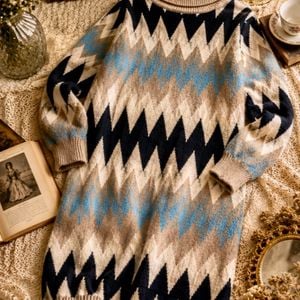 vestido midi de trico gola alta estampado 142483257?action_source=71711&ref=home_home&rsp=1&rspix=1
