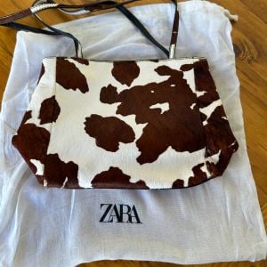 bolsa zara couro de vaca 147049177?action_source=77124&ref=home_home&rsp=1&rspix=1