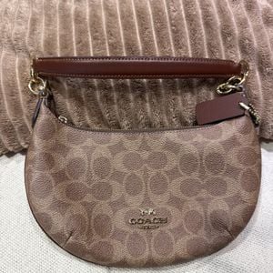 bolsa coach pequena marrom com etiqueta 146818208?action_source=67222&ref=home_home&rsp=1&rspix=1