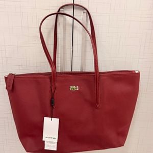 bolsa lacoste tote vinho 147146954?action_source=67222&ref=home_home&rsp=1&rspix=1