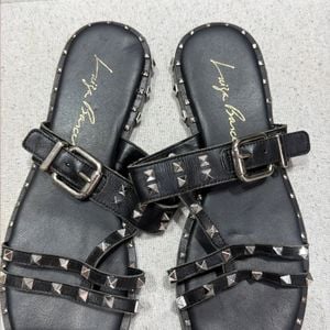 rasteira luiza barcelos spikes preta 153532877?action_source=77487&ref=home_home&rsp=1&rspix=1