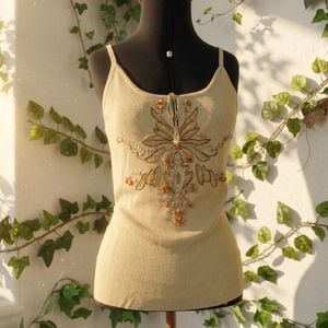 blusa angel bordada bege g 141743642?action_source=73496&ref=home_home&rsp=1&rspix=1