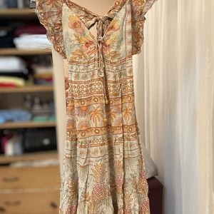 vestido midi farm 131613452?action_source=66827&ref=home_home&rsp=1&rspix=1