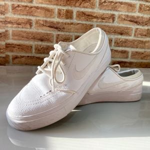 tenis nike janoski de couro branco 98482430?action_source=69863&ref=home_home&rsp=1&rspix=1