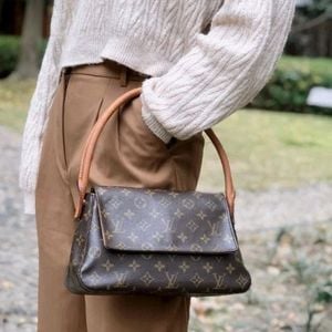 bolsa louis vuitton looping monograma 141705669?action_source=76495&ref=home_home&rsp=1&rspix=1