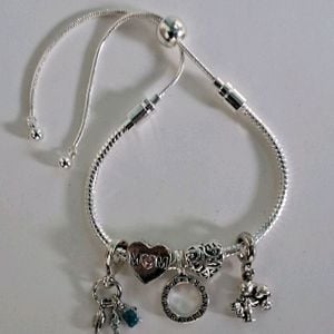 pulseira de prata com berloques 144154482?action_source=67326&ref=home_home&rsp=1&rspix=1