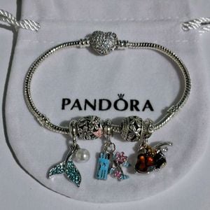 pulseira de prata com berloques 143827252?action_source=67326&ref=home_home&rsp=1&rspix=1