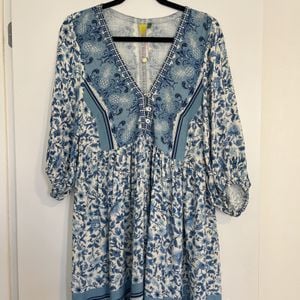 vestido curto farm estampado azul p 151680115?action_source=77221&ref=home_home&rsp=1&rspix=1