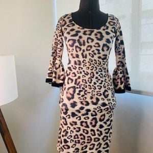 vestido animal print 122062331?action_source=32581&ref=home_home&rsp=1&rspix=1