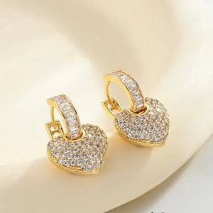 brinco vivara argola coracao dourado 144026681?action_source=67326&ref=home_home&rsp=1&rspix=1