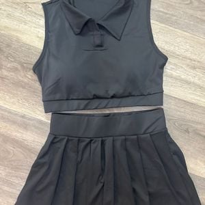 conjunto feminino short saia e top preto p 148423976?action_source=74549&ref=home_home&rsp=1&rspix=1