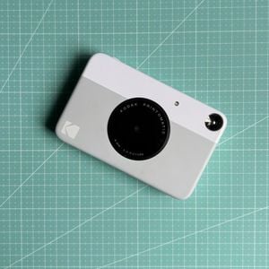 kodak printomatic cinza 133216309?action_source=31319&ref=home_home&rsp=1&rspix=1