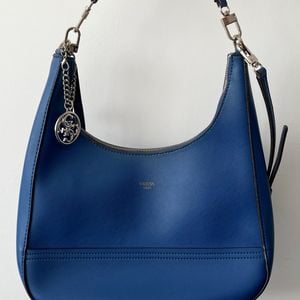 bolsa guess azul vintage 147035934?action_source=76594&ref=home_home&rsp=1&rspix=1