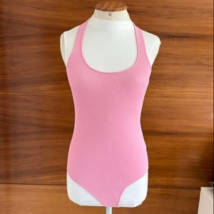 body canelado rosa 135497451?action_source=68477&ref=home_home&rsp=1&rspix=1