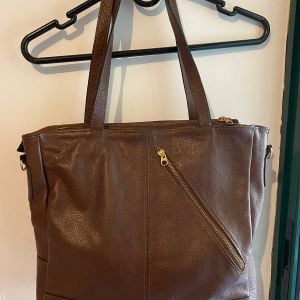 bolsa de couro marrom 145684303?action_source=67222&ref=home_home&rsp=1&rspix=1
